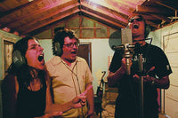 Nina Katchadourian, Adam Bork, and David Beebe recording a Marfa Jingle